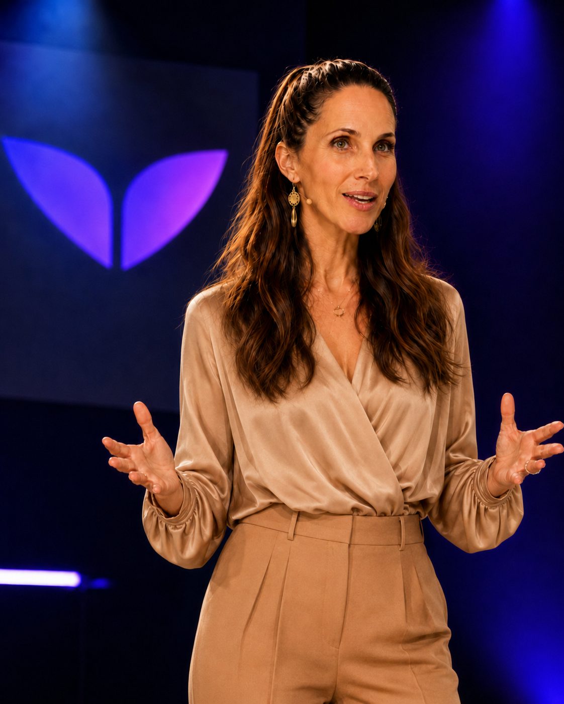 Yvette Farkas speaking on stage